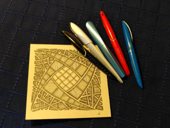 About me: four fountain pens and a zentangle tile